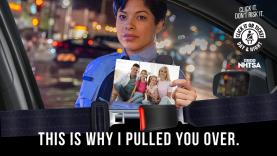 Law enforcement officer holding family photo, text reads: This Is Why I Pulled You Over