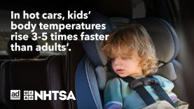 A young child sits in a rear car seat, secured with a harness inside a parked vehicle. A safety message on the image warns that children’s body temperatures rise 3–5 times faster than adults’ in hot cars. 